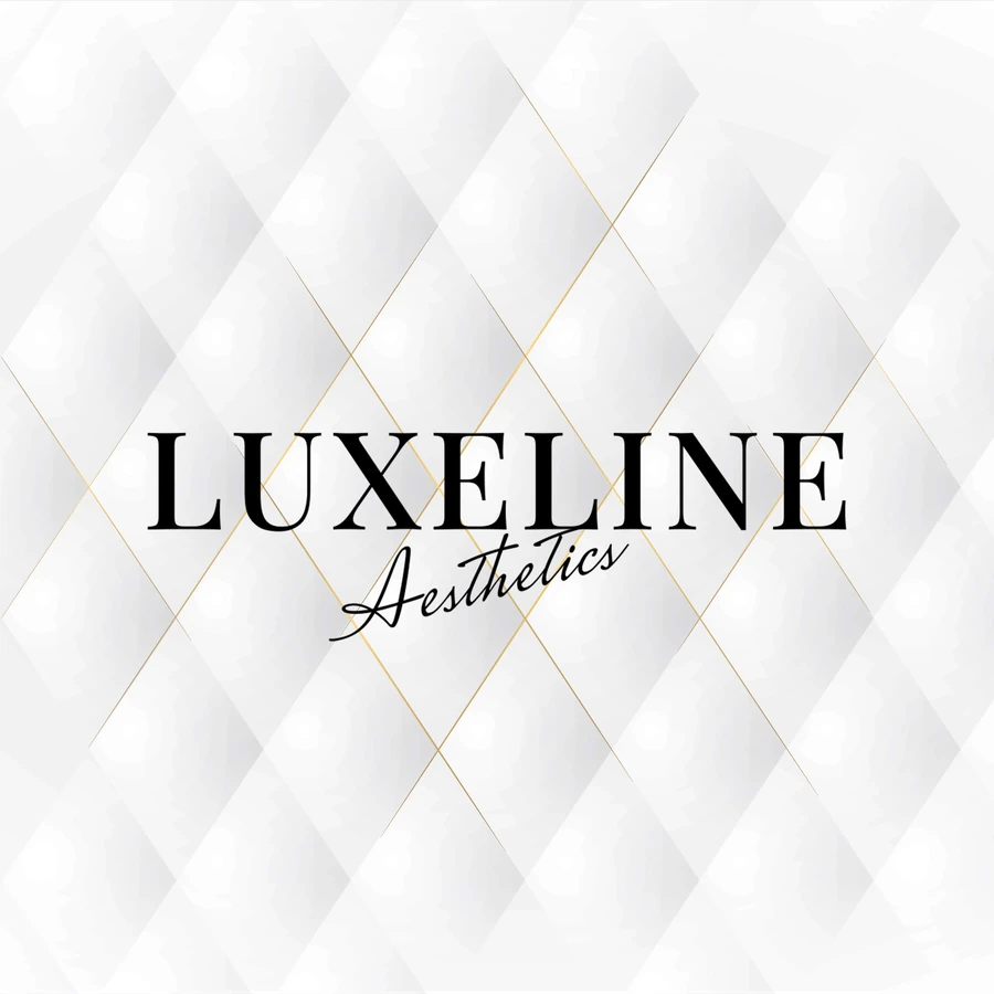 Luxeline Aesthetics logo in black serif capitals with Aesthetics in script, on a quilted white background