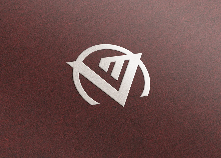 The VapeMeet logo mark, a geometric V inside a broken circle, embossed in silver on oxblood leather